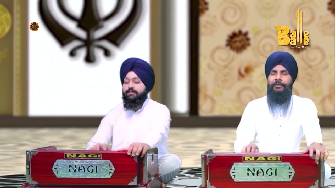 Two men in white are seated, playing harmoniums with the name "Nagi" emblazoned on them. Above, the Balle Balle logo indicates a performance is underway.
