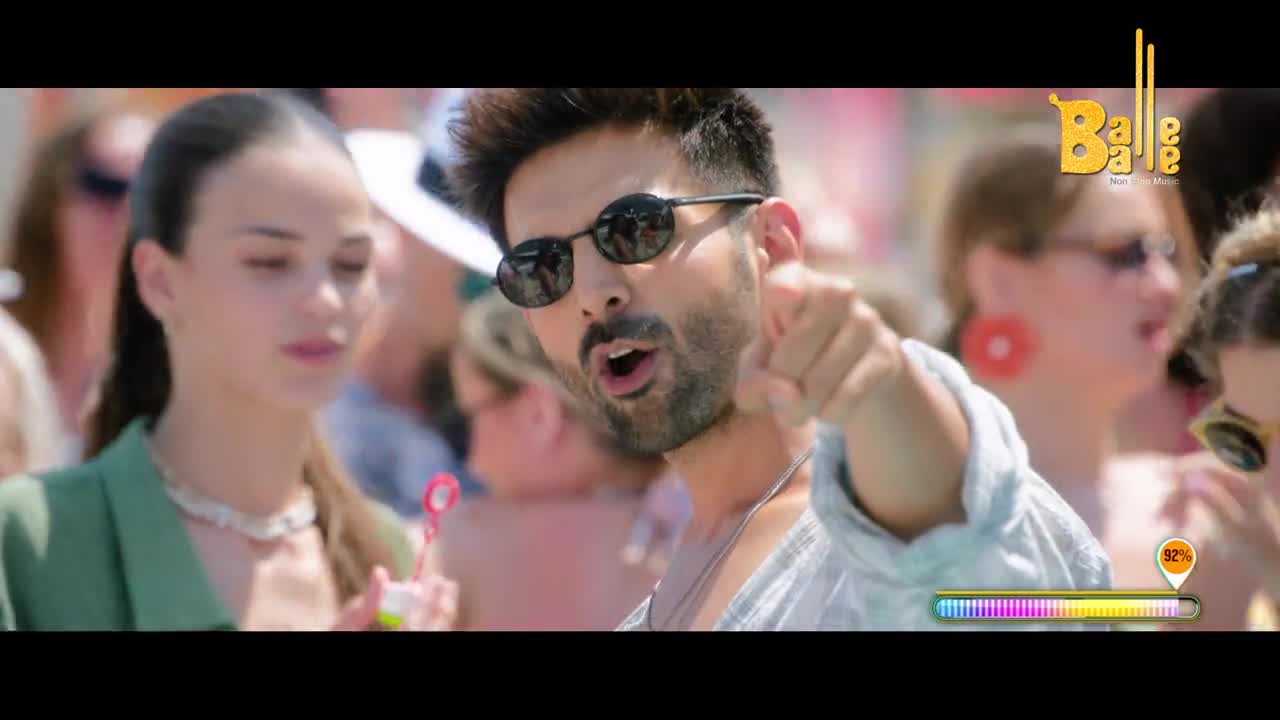 A man in sunglasses points directly at me, mouth open as if he's singing. The "Balle Balle" logo sits in the top right, and a progress bar pulses below.
