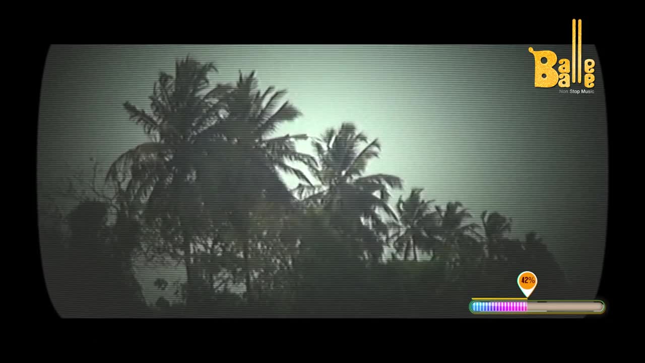 Palm fronds sway against a hazy sky. A progress bar shows 42% complete.