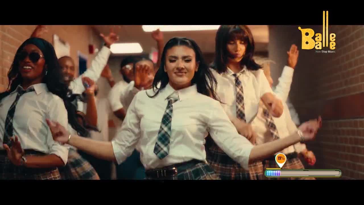A group of young women in school uniforms dance with energy. Their movements are synchronized, and the Balle Balle logo suggests a lively Indian music video.
