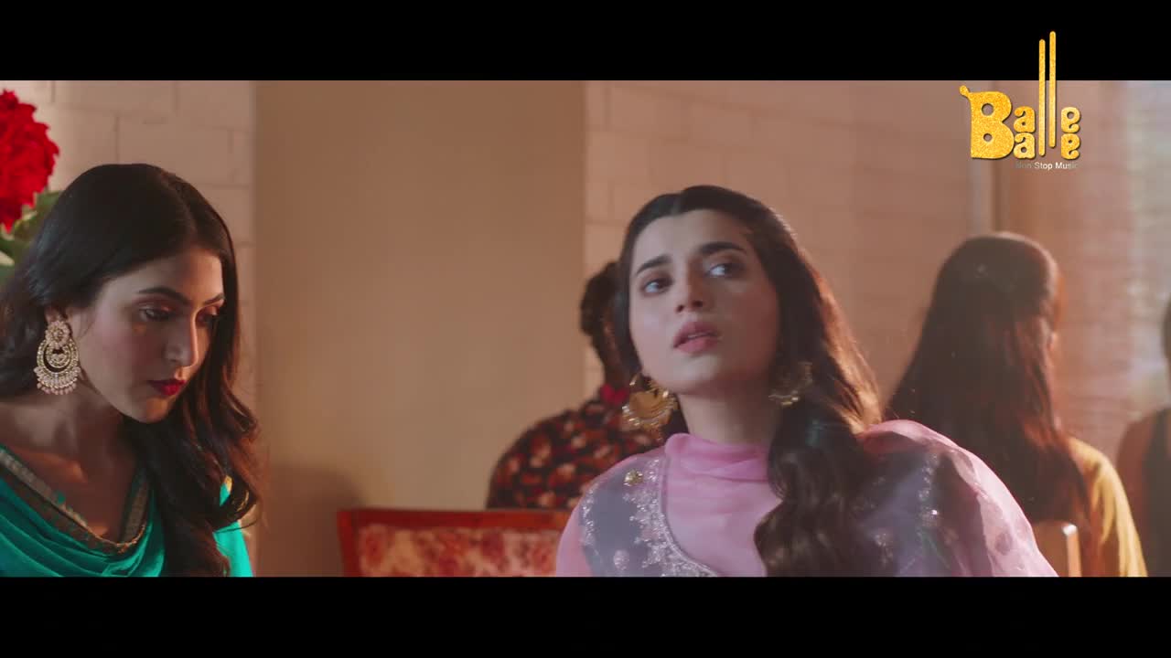 Two women in traditional Indian attire are seated, their expressions thoughtful. The Balle Balle logo appears in the upper right corner.