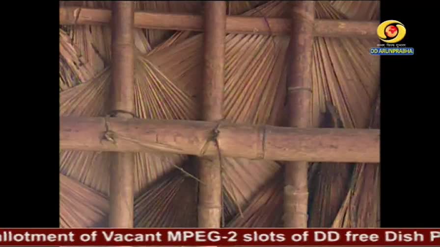 The roof is made of woven palm fronds supported by bamboo poles. A small logo for DD Arunprabha appears in the upper right corner.