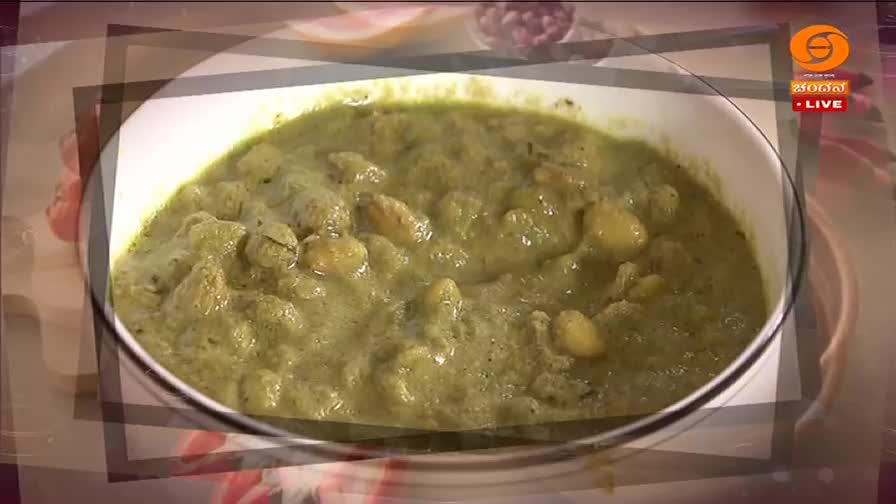 A steaming bowl of green curry sits before me, chunks of potato visible within the rich sauce. The DD Chandana logo flashes in the corner, indicating this is a live broadcast from India.