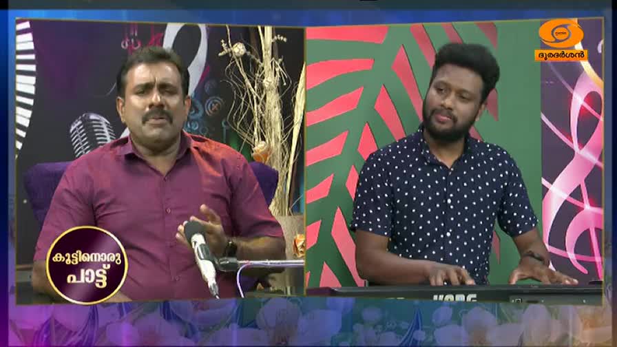 A man sings into a microphone, his hand gesturing expressively. Beside him, another man plays a keyboard, his fingers moving across the keys. A man sings into a microphone, his hand gesturing expressively. Beside him, another man plays a keyboard, his fingers moving across the keys.