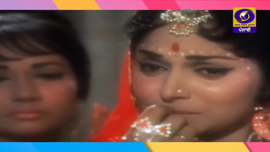 Two women, adorned in traditional Indian jewelry and makeup, appear on screen. The DD Punjabi logo is visible in the upper right corner.