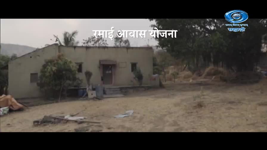 A modest house stands in a dusty yard, with a few trees and piles of straw in the background. The DD Sahyadri logo appears in the upper right corner.