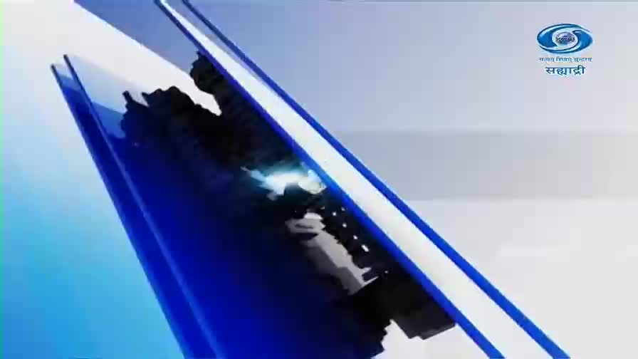 Sharp, angular blue shapes slice across the screen, revealing a fragmented, dark silhouette of India. A bright, white light flares from within the country's outline, hinting at a broadcast from DD Sahyadri.