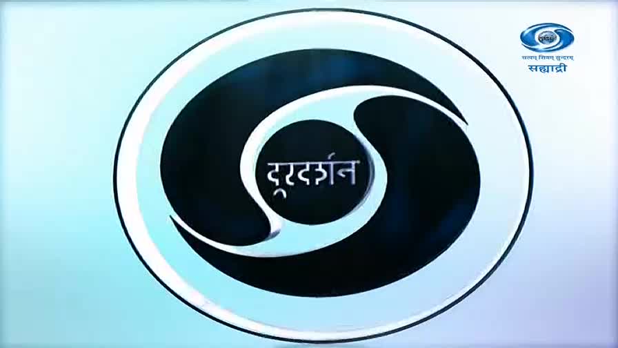 The iconic Doordarshan logo, a stylized 'S' in black and white, rotates slowly against a pale blue background. Above it, the DD Sahyadri logo, a smaller version of the same symbol with text, is visible. The iconic Doordarshan logo, a stylized 'S' in black and white, rotates slowly against a pale blue background. Above it, the DD Sahyadri logo, a smaller version of the same symbol with text, is visible.