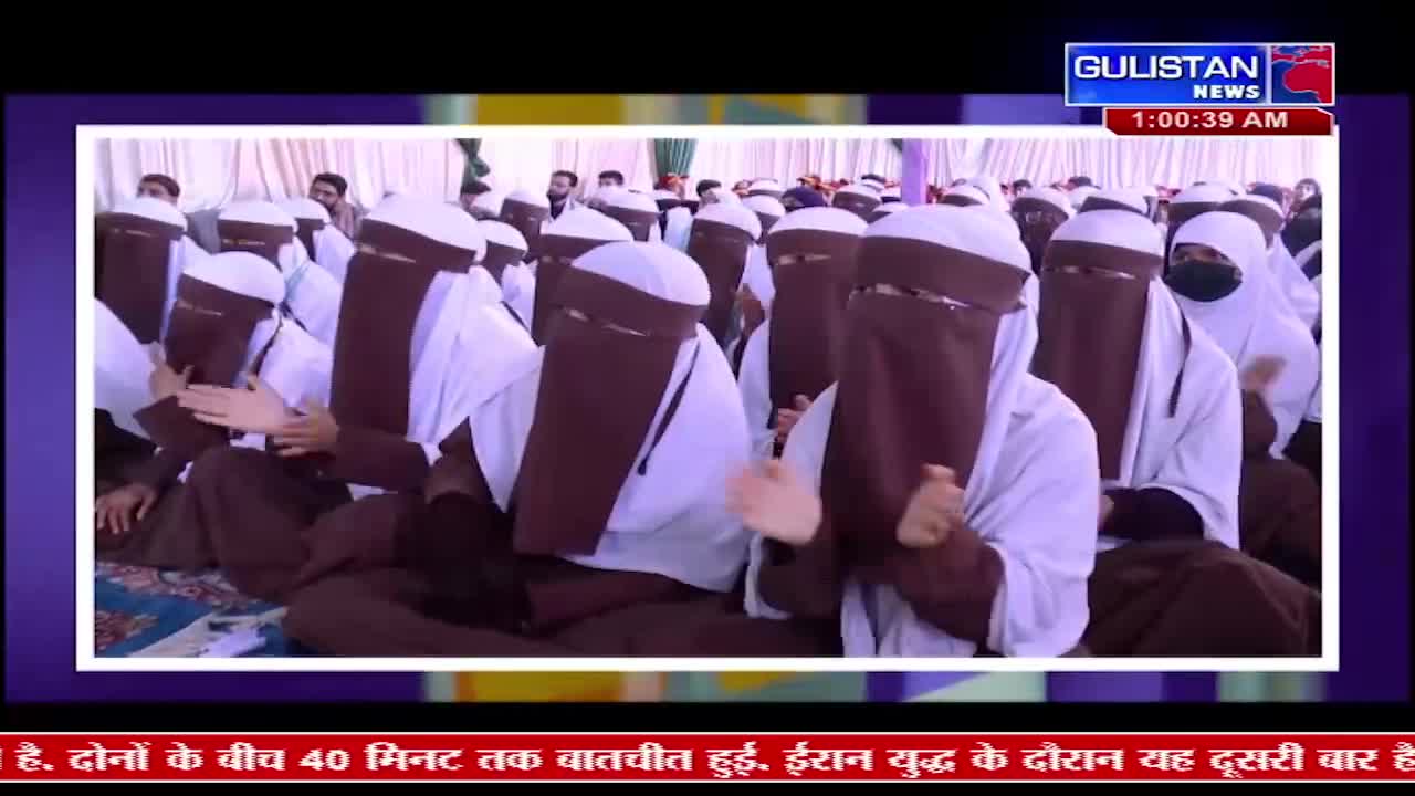 A crowd of women, all wearing niqabs and white hijabs, are clapping. The Gulistan News chyron indicates this is a broadcast from India.