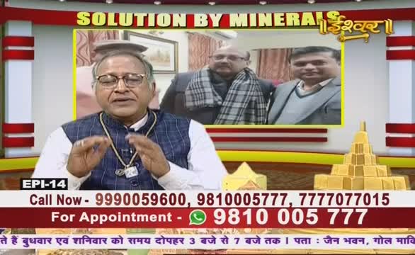 A man in glasses gestures with his hands, speaking on a television program. Behind him, a small image of two other men is displayed, and the Ishwar Bhakti TV logo is visible in the corner.
