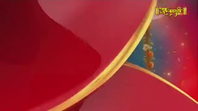 A golden vine, adorned with tiny white and orange flowers, dangles against a vibrant red background. The Ishwar Bhakti TV logo, in ornate script, hovers above.