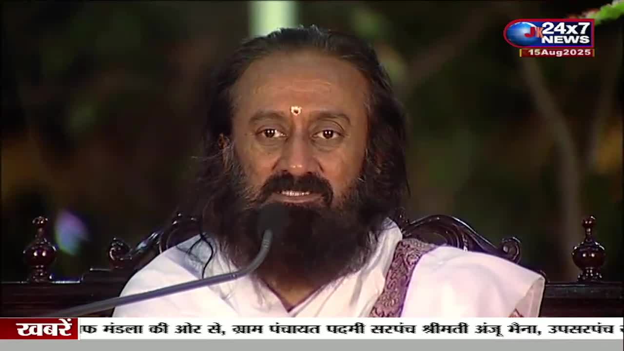 A man with a long beard and dark hair speaks into a microphone, his face centered on the screen. The JK 24x7 News logo and date are visible in the upper right corner, and a news ticker scrolls along the bottom.

