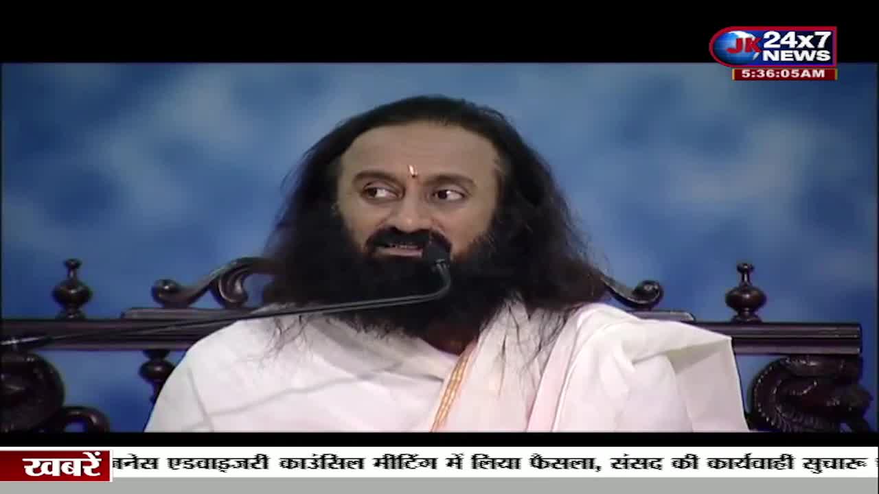 A man with a long beard and hair speaks into a microphone, his gaze directed slightly to the side. The JK 24x7 News logo is visible in the upper right corner, and text in Hindi scrolls at the bottom of the screen.
A man with a long beard and hair speaks into a microphone, his gaze directed slightly to the side. The JK 24x7 News logo is visible in the upper right corner, and text in Hindi scrolls at the bottom of the screen.