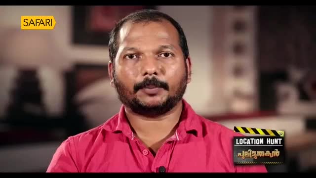 A man with a beard and mustache, wearing a bright pink shirt, looks directly ahead. A yellow "Safari" logo sits in the upper left corner, and a "Location Hunt" graphic appears near his right shoulder. A man with a beard and mustache, wearing a bright pink shirt, looks directly ahead. A yellow "Safari" logo sits in the upper left corner, and a "Location Hunt" graphic appears near his right shoulder.