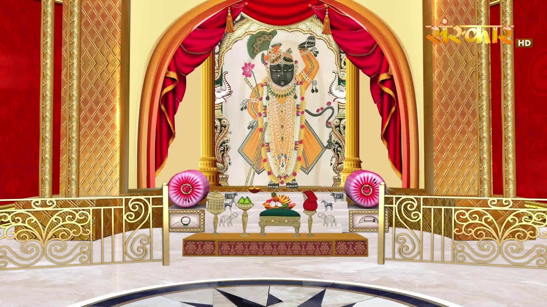 A vibrant altar is set for worship, with a painted deity at its center. The Sanskar TV logo is visible in the upper right corner.
