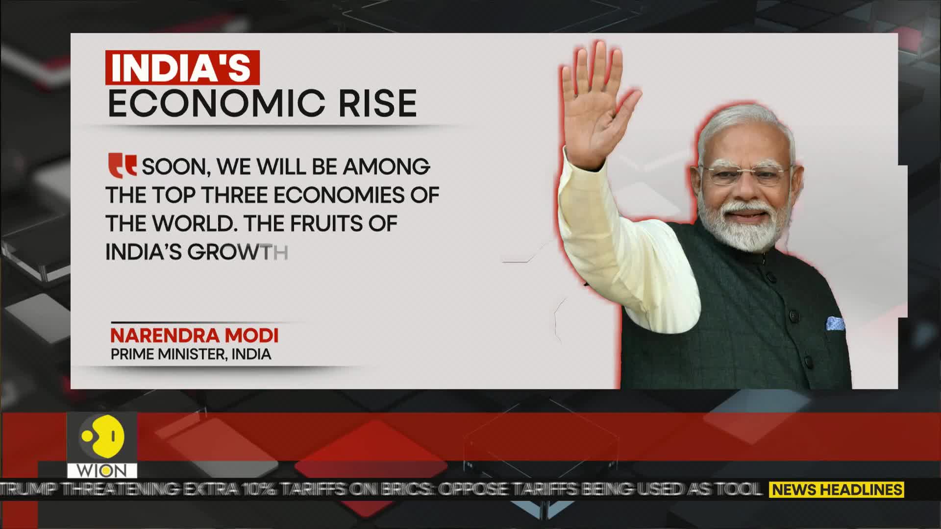 Narendra Modi, Prime Minister of India, waves with his right hand, smiling at the camera. The WION news graphic highlights India's economic growth and future ambitions.
