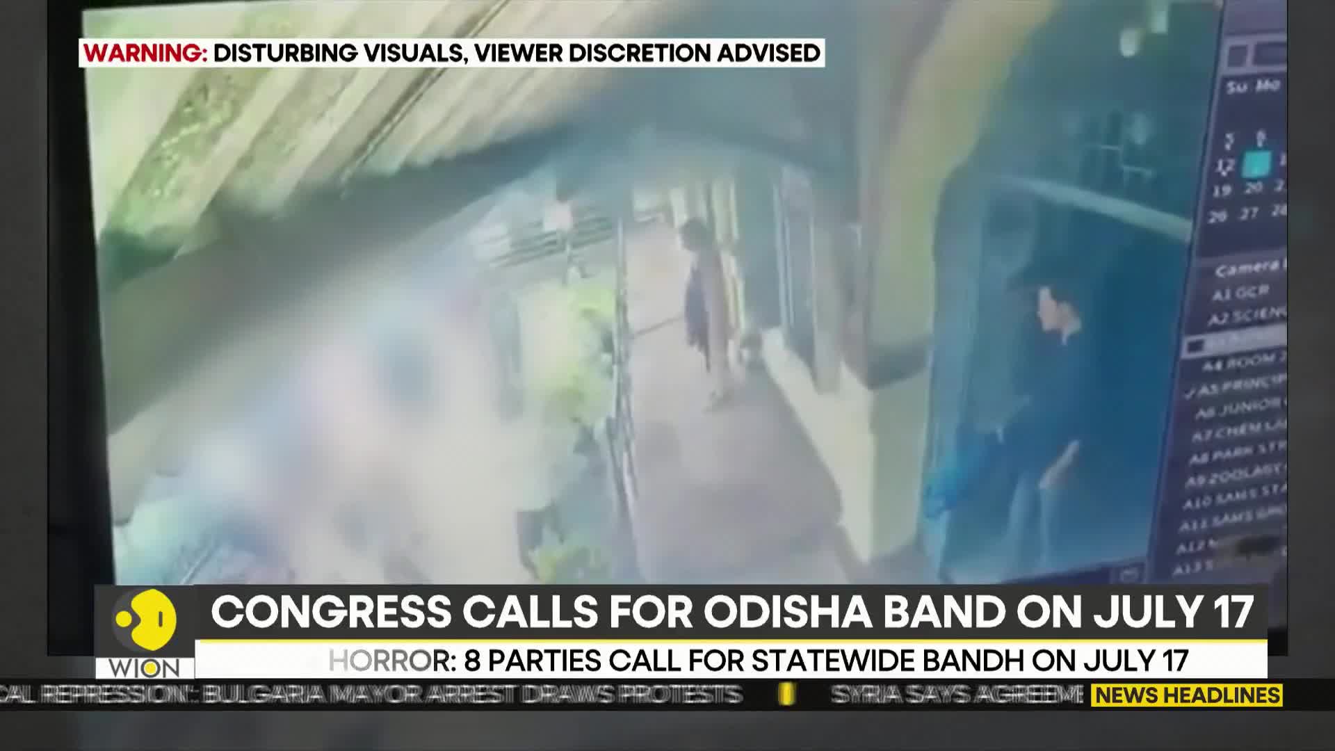 On the screen, a person walks down a narrow corridor, and another stands further down. The WION news ticker warns of disturbing visuals.
