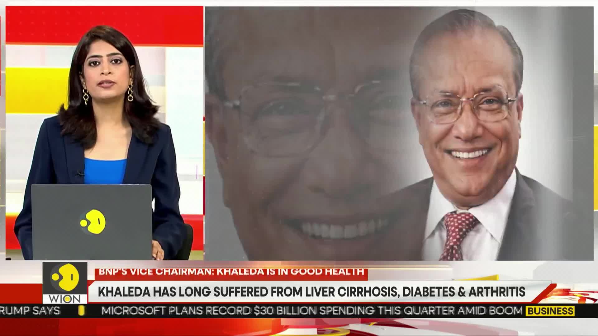 A news anchor, framed against a backdrop of red, yellow, and white, speaks directly to the camera. Beside her, a smiling man in glasses and a tie is featured in a large, slightly blurred image.

