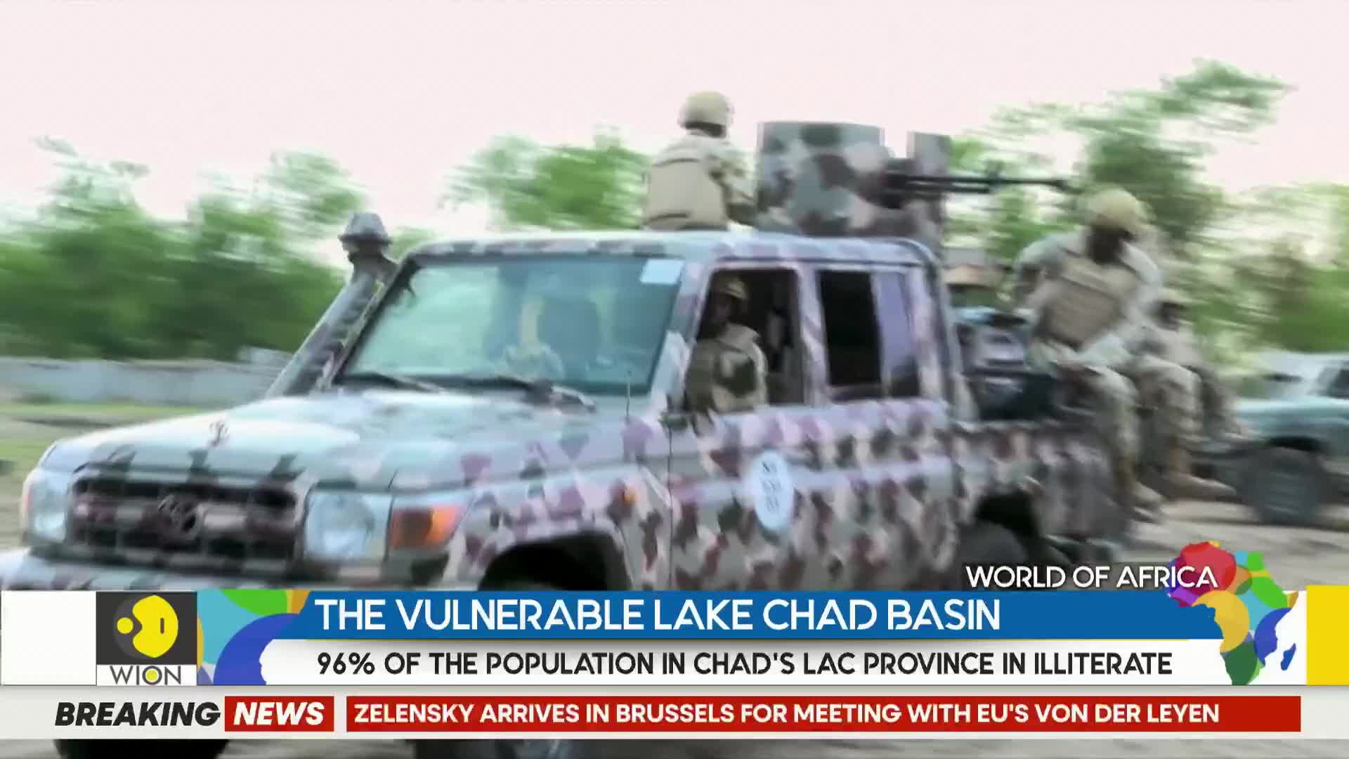 A camouflage-painted jeep speeds past, soldiers perched on top and in the back. The WION news banner at the bottom highlights the vulnerable Lake Chad Basin.

