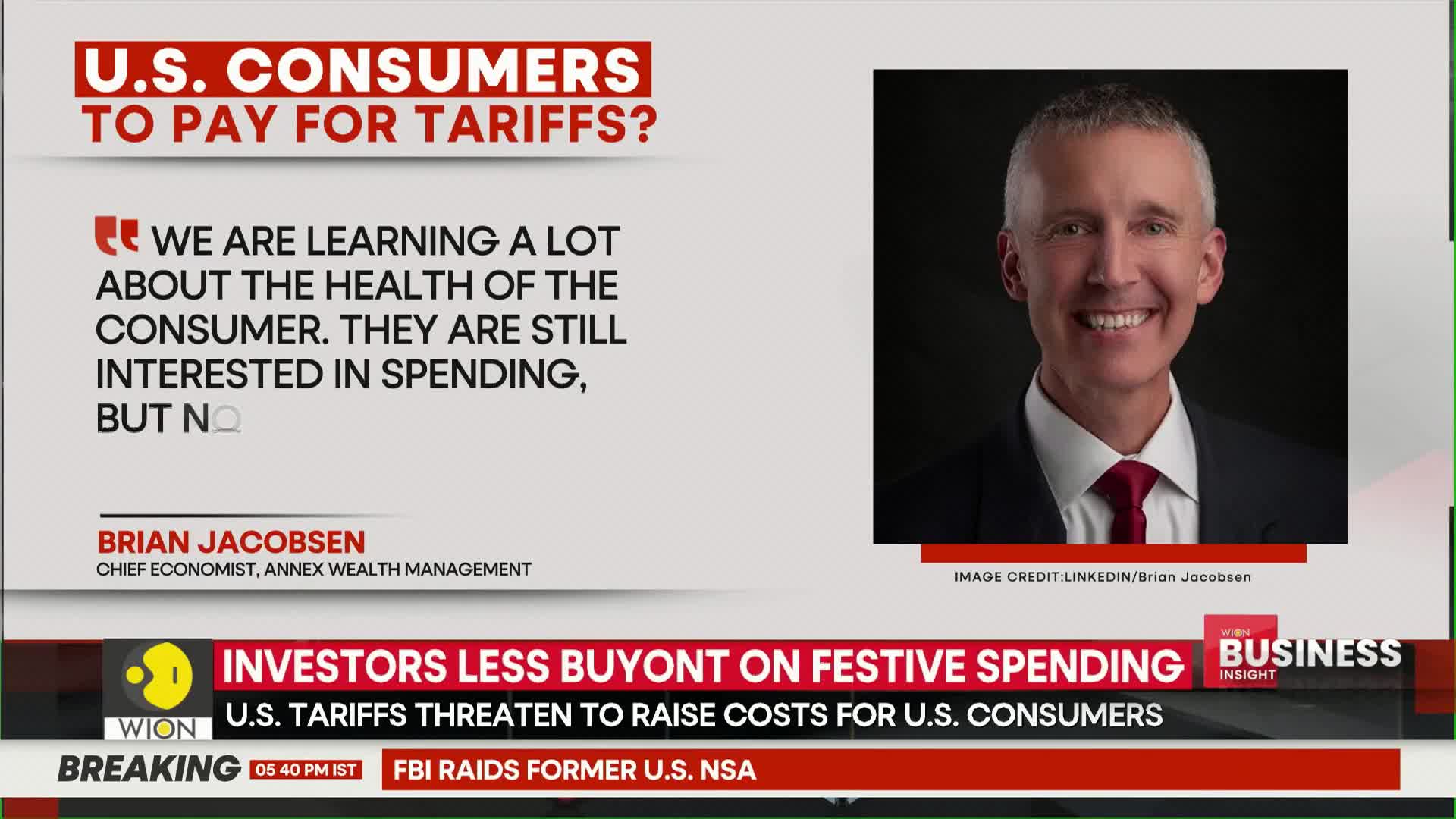 A segment from the Indian news channel WION is on the screen, with a headline about U.S. tariffs. Brian Jacobsen, a chief economist, is quoted on the topic, while a headshot of him smiles from the corner.
