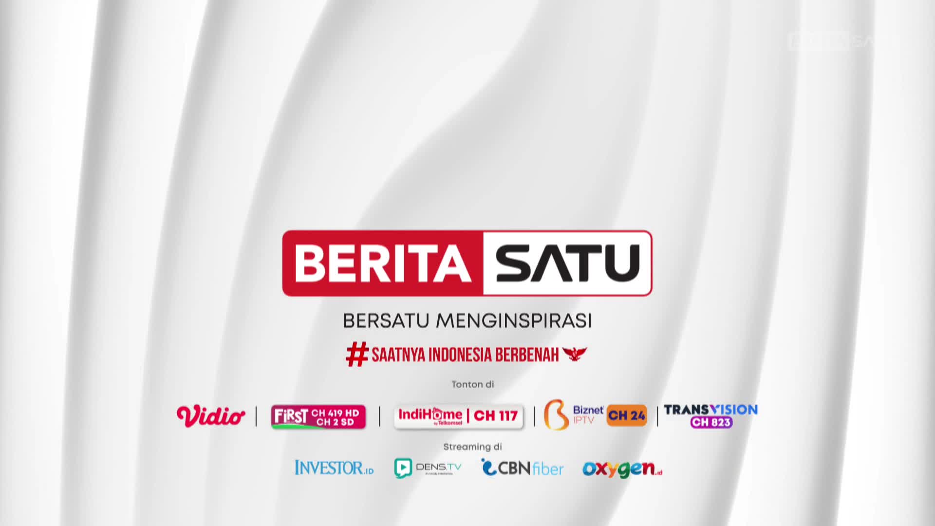 A red and white logo for BeritaSatu, an Indonesian news outlet, sits prominently against a white, abstract background. Below, various platforms and streaming services are listed, indicating where viewers can watch.
