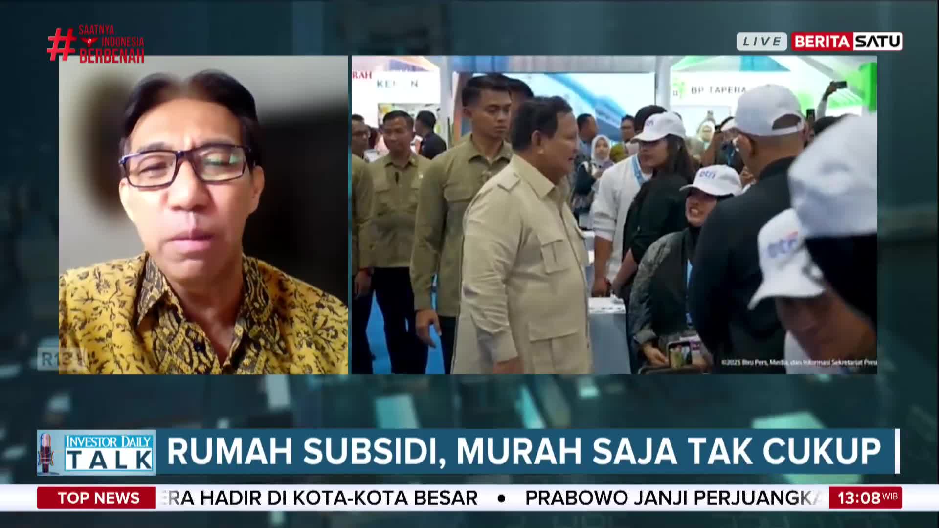 A man in glasses speaks on a split screen as Prabowo, in a tan uniform, walks through a crowd at what looks like a housing expo. BeritaSatu English is broadcasting live from Indonesia, covering the event.
