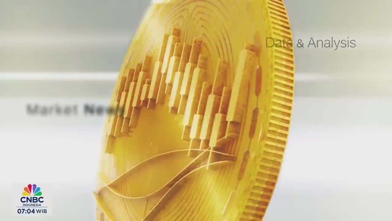 A golden coin-like structure displays a stylized graph, likely for CNBC Indonesia's financial news. The logo and time are visible at the bottom, indicating the broadcast's current segment.
