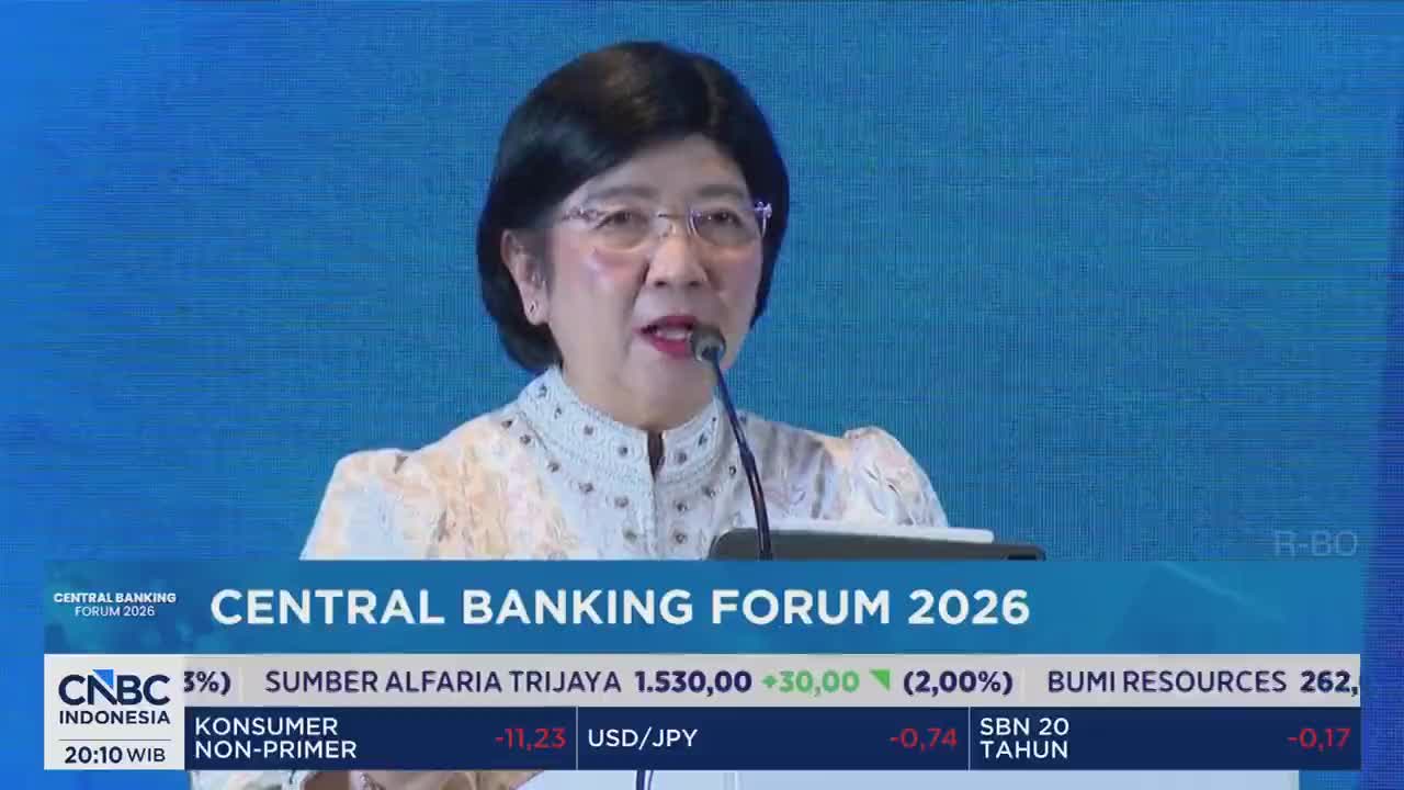 A woman speaks at a podium during the Central Banking Forum 2026. Below her, a CNBC Indonesia ticker scrolls with stock information. A woman speaks at a podium during the Central Banking Forum 2026. Below her, a CNBC Indonesia ticker scrolls with stock information.
