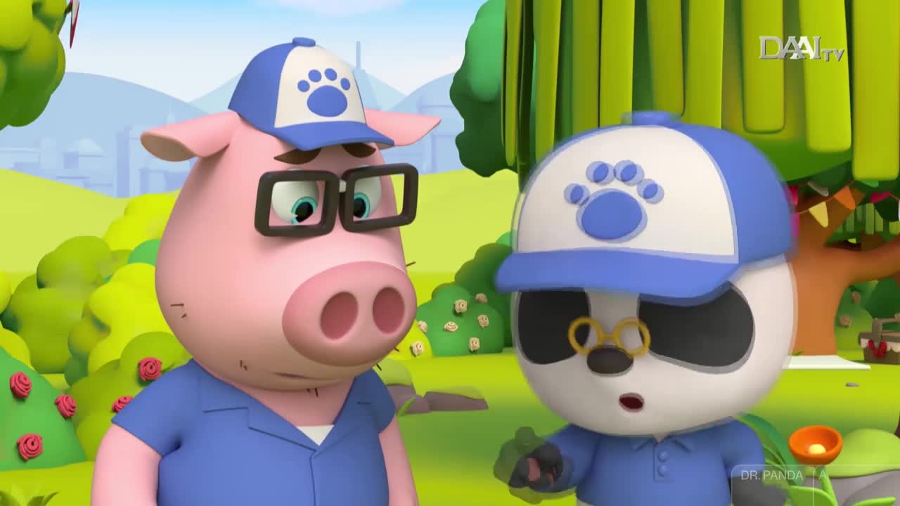 A pink pig with glasses and a blue cap is looking at a panda, also in a blue cap, who seems surprised. The scene is set outside, likely from an Indonesian DAAI TV show, with cartoon trees and bushes in the background.
