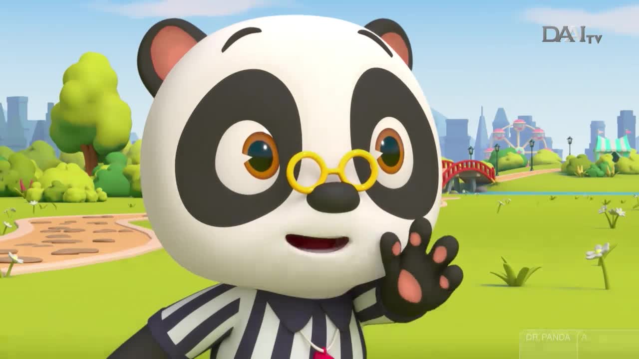A panda in a referee uniform waves, its black paw raised. The scene, from DAAI TV, is a sunny park with a bridge and a city skyline in the distance.

