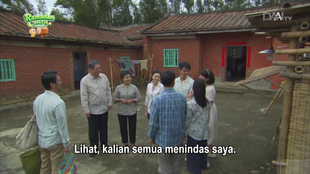 A group of people stand in a courtyard, their faces turned towards each other. The DAAI TV logo is visible in the upper right corner, and a Ramadan 1447 H graphic appears on the roof of the building.