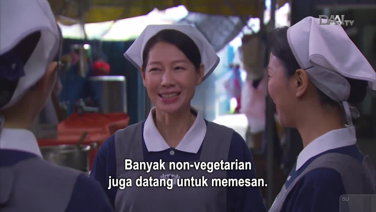 A woman in a nurse's uniform smiles broadly while talking to a colleague. The DAAI TV logo appears in the corner, suggesting this is a broadcast from Indonesia. A woman in a nurse's uniform smiles broadly while talking to a colleague. The DAAI TV logo appears in the corner, suggesting this is a broadcast from Indonesia.