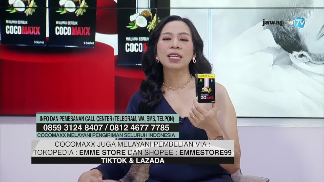 On Jawa Pos TV, a woman holds up a small box of "COCOMAXX" while speaking directly to the camera. Below, a scrolling banner displays contact information and online retailers for the product.
