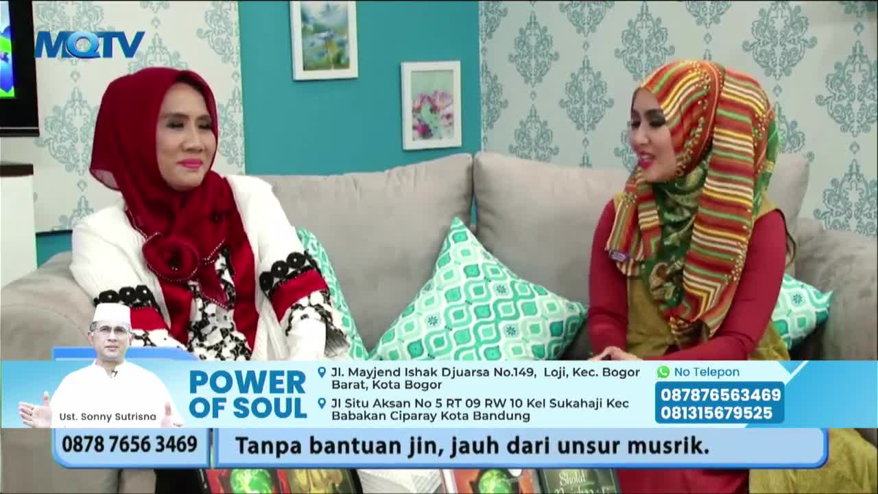 Two women in headscarves sit on a couch, engaged in a conversation on an MQTV set. Below them, a graphic for "Power of Soul" with contact information and a religious statement overlays the bottom of the screen.
