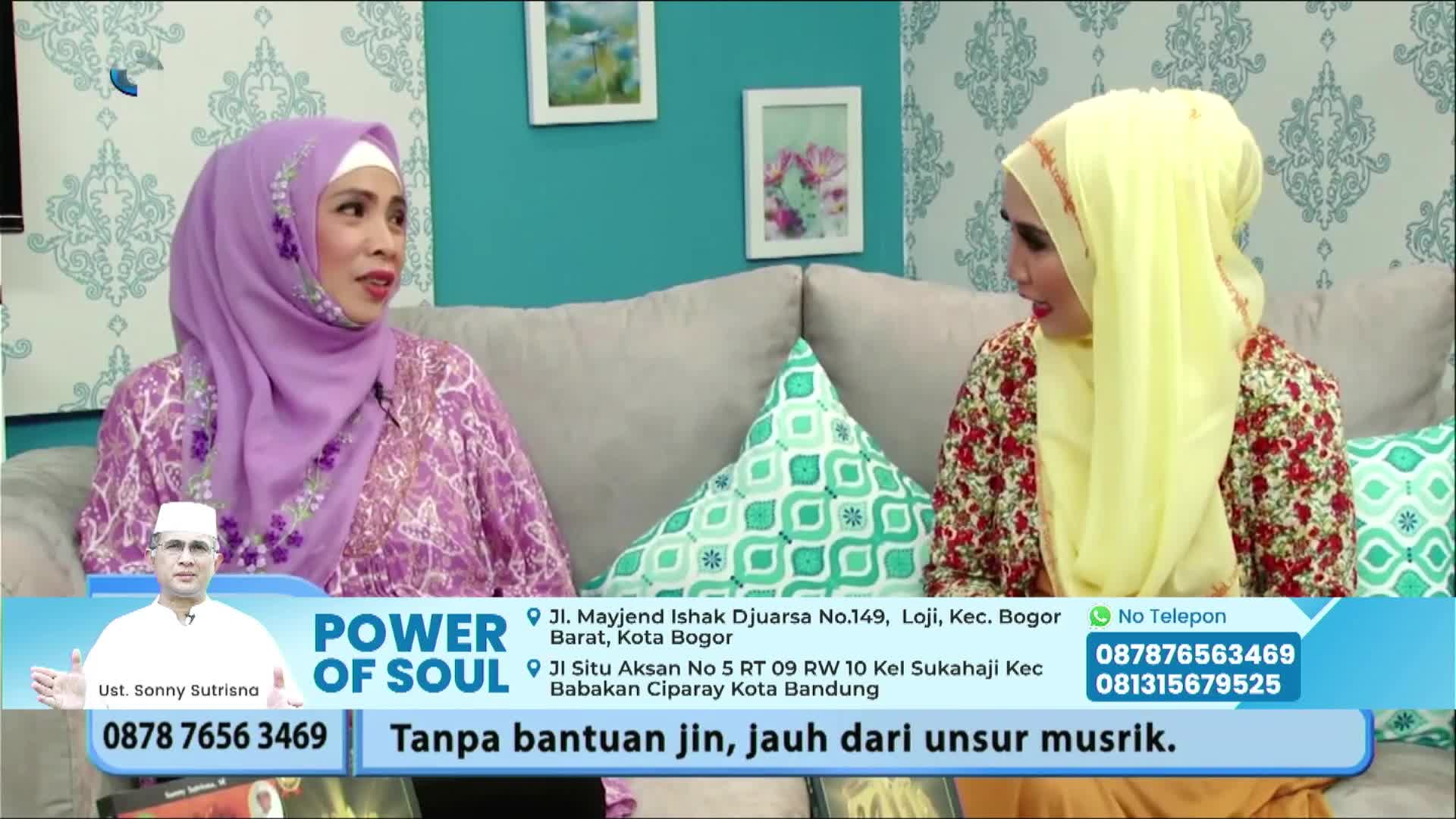 Two women in headscarves are seated on a couch, engaged in conversation on a television set. A lower third banner identifies the program as "Power of Soul" and displays contact information.
