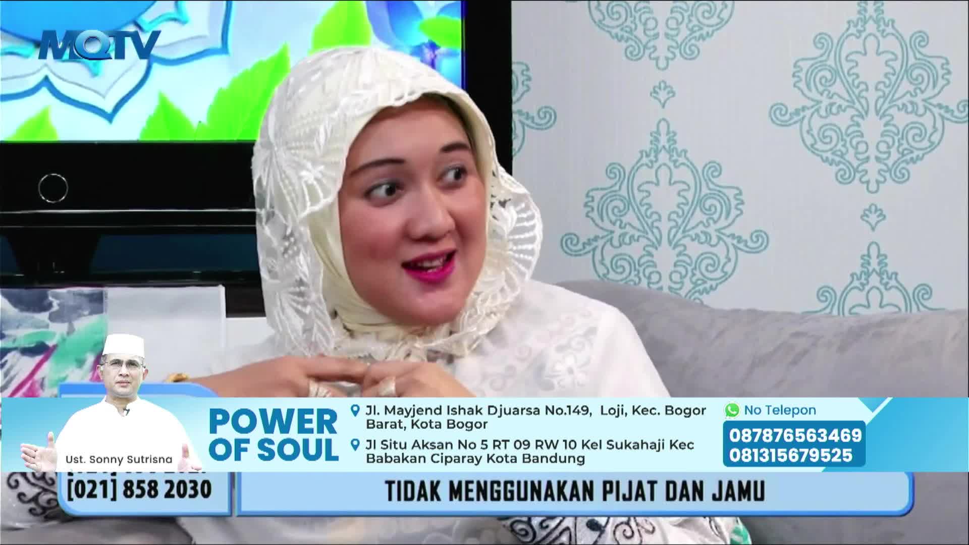 On MQTV, a woman in a white headscarf speaks animatedly, her expression lively. Below her, a graphic for "Power of Soul" with a phone number and address is displayed.
