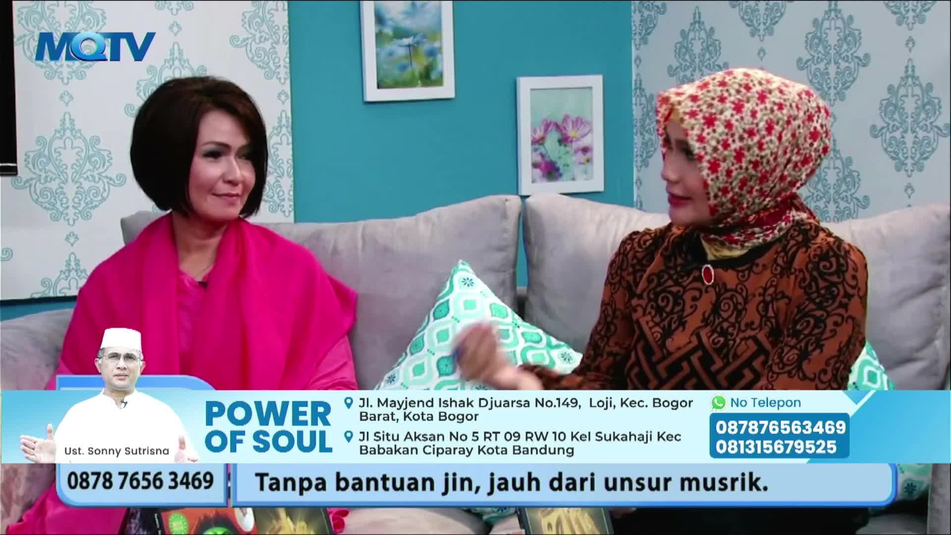 Two women are seated on a couch, engaged in conversation on the MQTV set. A graphic at the bottom promotes "Power of Soul" with a phone number and a message in Indonesian.

