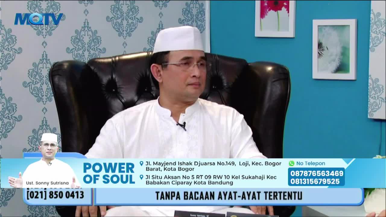 A man in a white cap and shirt sits in a large leather chair on an MQTV set. The screen displays a graphic for "Power of Soul" with contact information.
