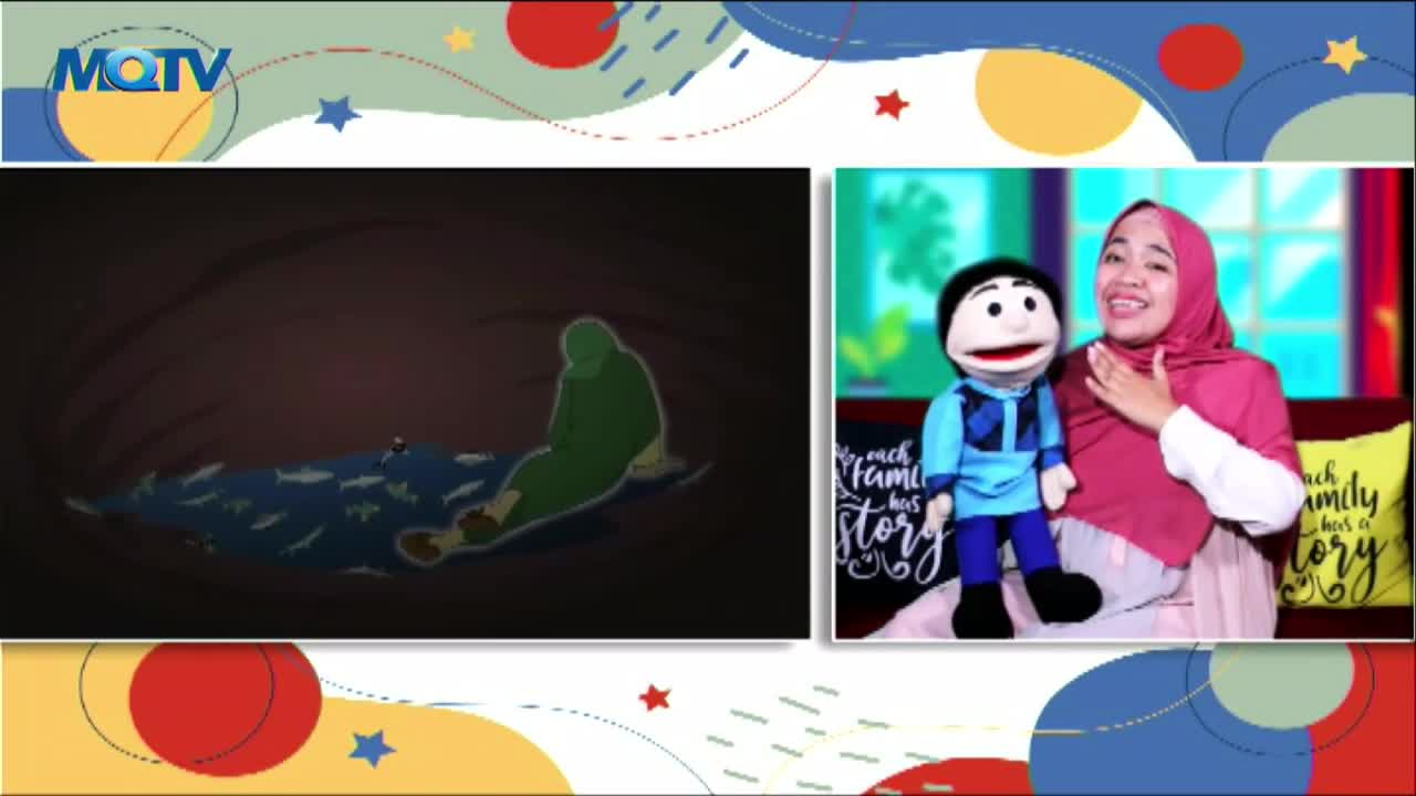 On the left, a cartoon figure in green sits near a body of water filled with fish.  Across the screen, a woman in a headscarf smiles with a puppet.
