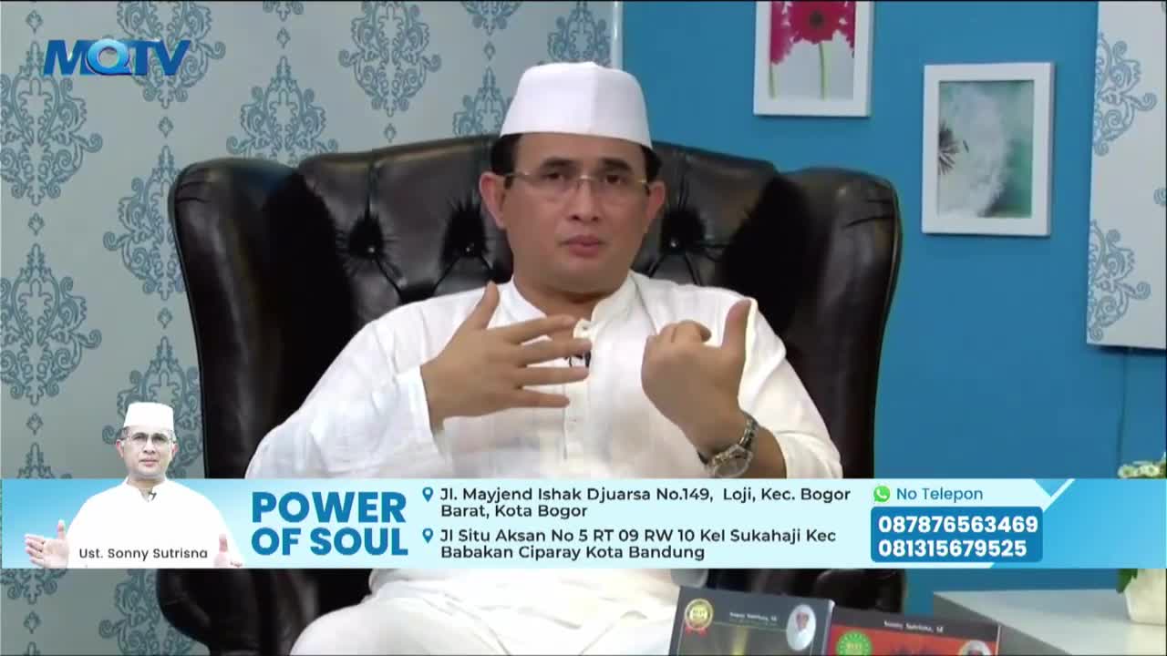 A man in a white cap and shirt gestures with his hands while seated in a black leather chair. The screen shows the MQTV logo and a graphic for "Power of Soul" with contact information.
