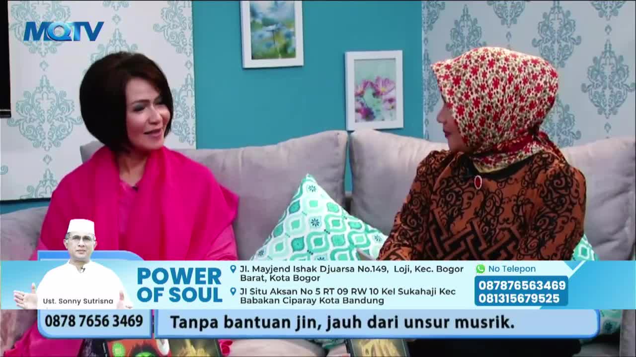 Two women are seated on a couch, engaged in conversation on an MQTV program. A lower third graphic promotes "Power of Soul" and displays contact information, including a phone number.
