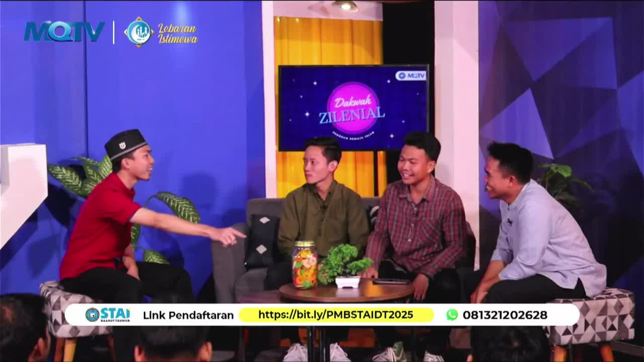 A young man in a red shirt gestures animatedly while speaking to three men seated on a couch. The MQTV logo is visible on a screen behind them, displaying the title "Dakwah Zilenial."