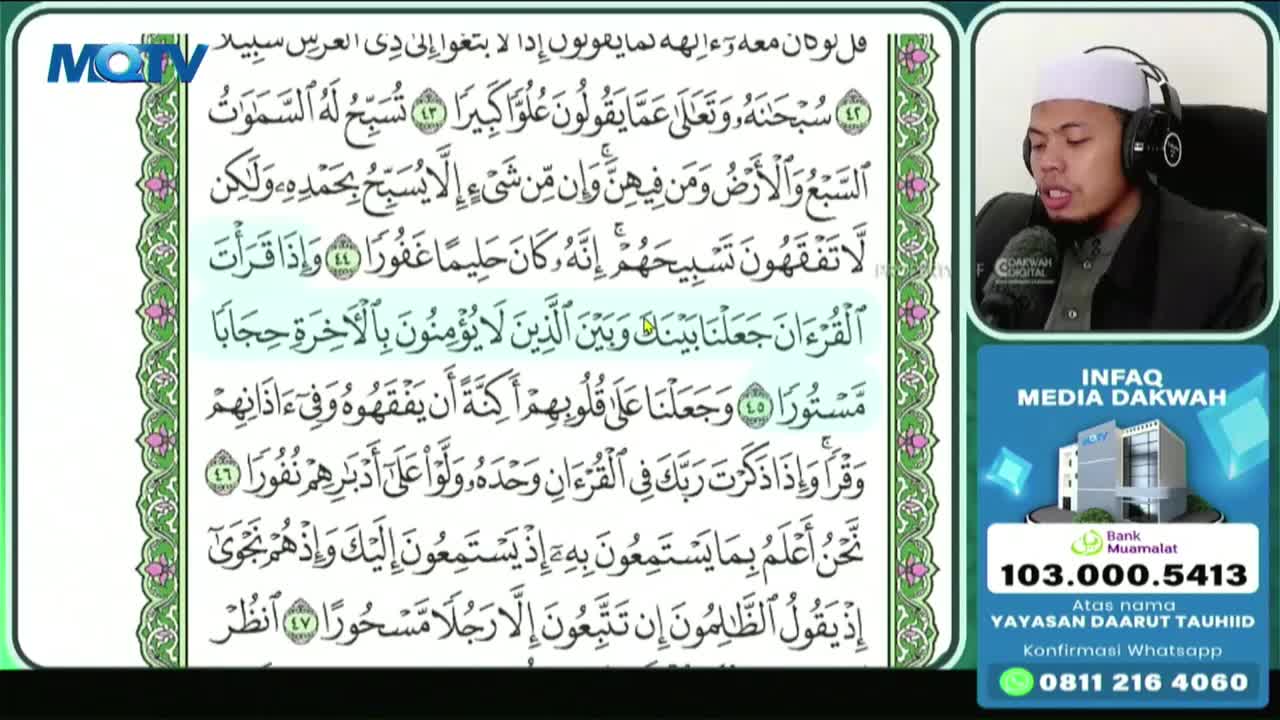 A man in a white cap speaks into a microphone, his face illuminated by the screen displaying Arabic script. Below him, a graphic advertises "INFAQ MEDIA DAKWAH" with a building and contact information.