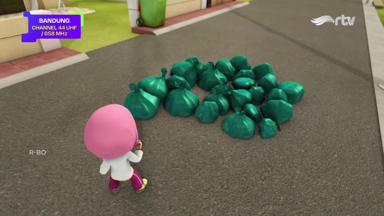 A cartoon character in a white coat and pink head is approaching a pile of green trash bags. The scene is from Rajawali Televisi, as indicated by the logo.
