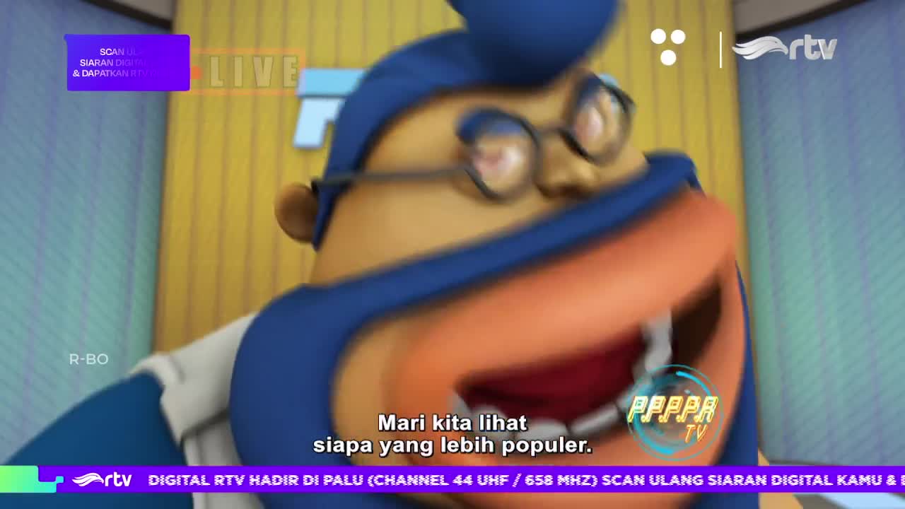 A cartoon character, wearing glasses and a blue cap, is speaking animatedly on Rajawali TV. The Indonesian channel's logo is visible, and text on the screen says "Mari kita lihat siapa yang lebih populer."
