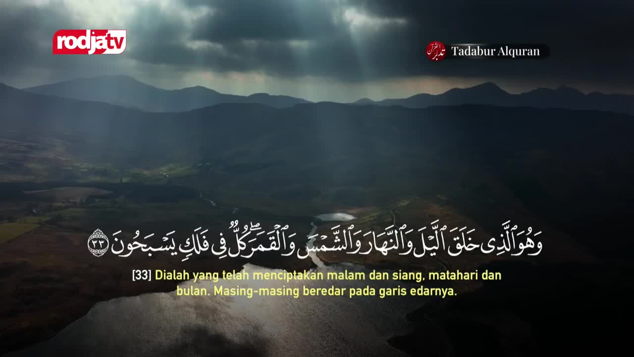 Sunlight breaks through the clouds, illuminating a vast, mountainous landscape. Arabic script, likely from a Rodja TV broadcast, overlays the scene, alongside Indonesian text.