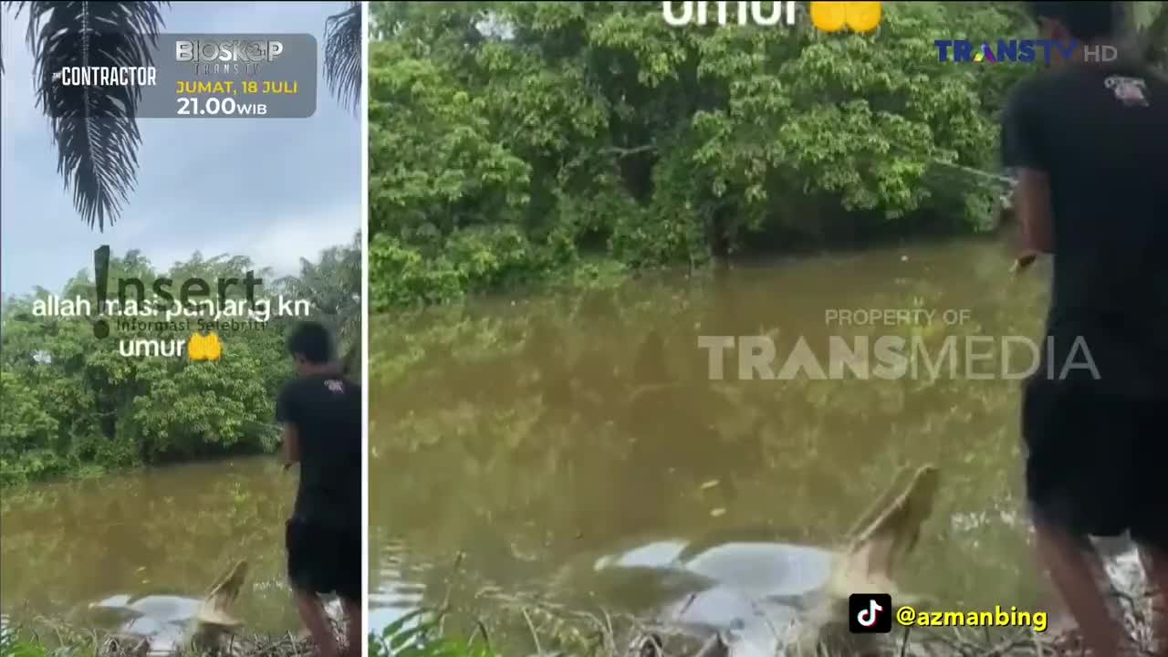 A man stands at the edge of murky water, holding a fishing rod as a large animal surfaces. The scene, branded with Trans TV, appears to be part of a broadcast from Indonesia.
