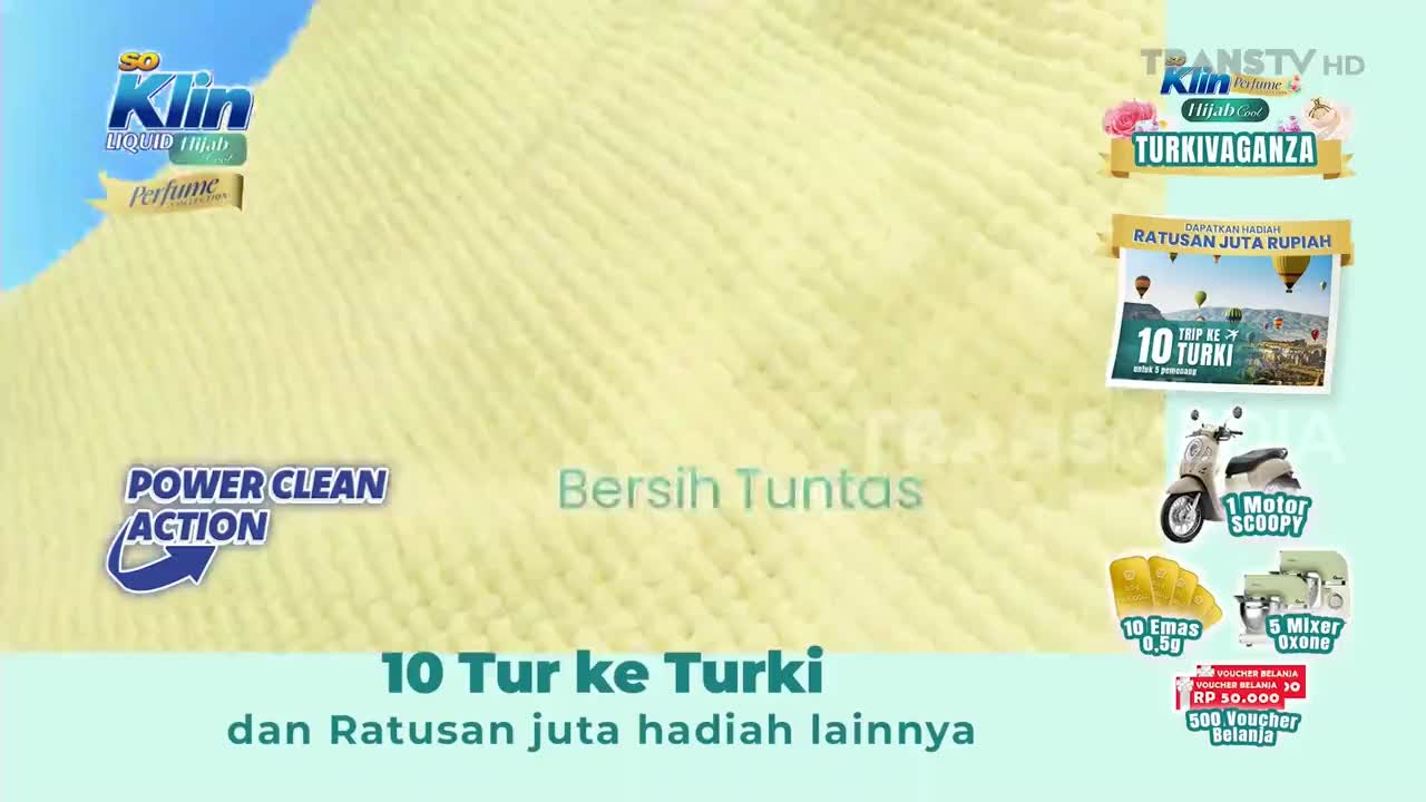 The "So Klin" detergent ad on Trans TV is promoting a sweepstakes, with a trip to Turkey and other prizes on offer. A textured yellow fabric fills most of the screen, with prize graphics layered on top.
