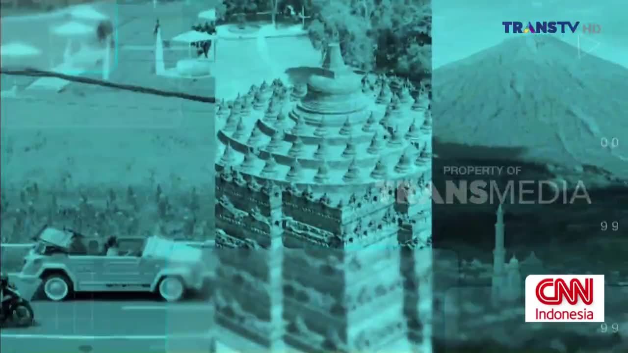 A light-colored, open-top car drives past a motorcycle on a road in Indonesia. In the background, the intricate stone carvings of Borobudur temple rise up, reflected in water.
