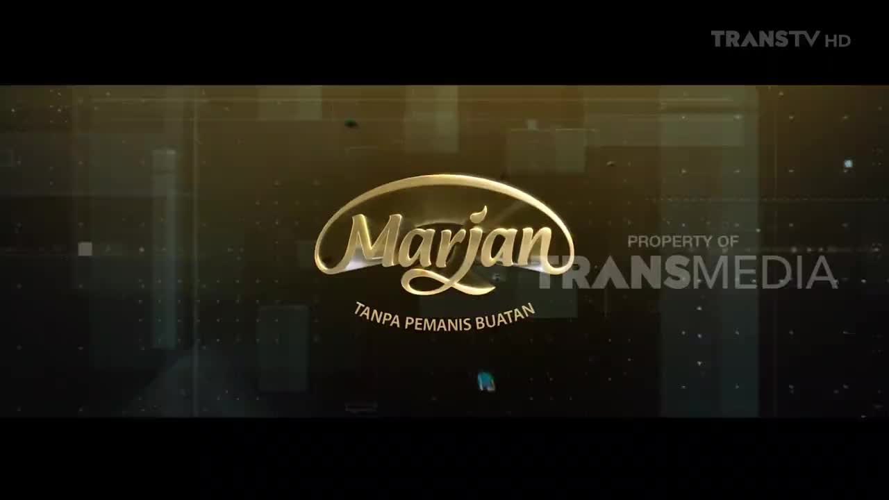 A golden "Marjan" logo shimmers against a dark, textured background. Below it, smaller text reads "TANPA PEMANIS BUATAN," and to the right, "PROPERTY OF TRANS MEDIA" is clearly visible.
